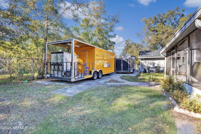 view of yard with an outdoor structure