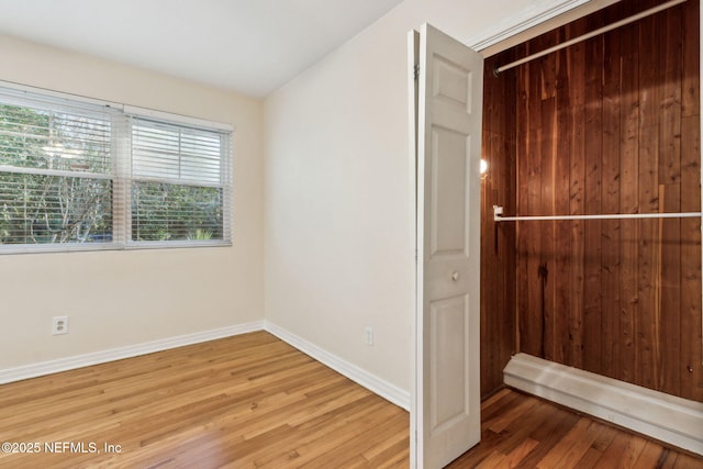 unfurnished bedroom featuring hardwood / wood-style floors