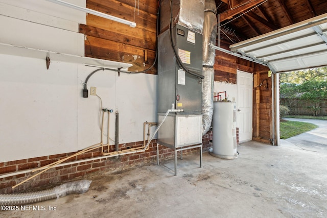 garage with water heater and heating unit