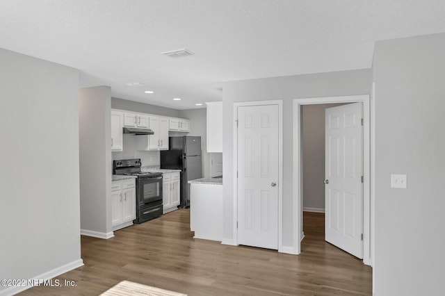 kitchen with black appliances, light stone counters, white cabinetry, and dark wood-type flooring