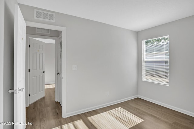 empty room featuring light hardwood / wood-style floors