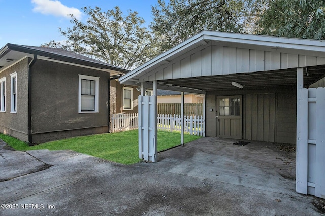 exterior space featuring a carport