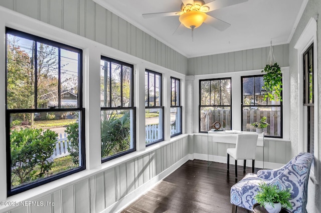 sunroom / solarium with ceiling fan