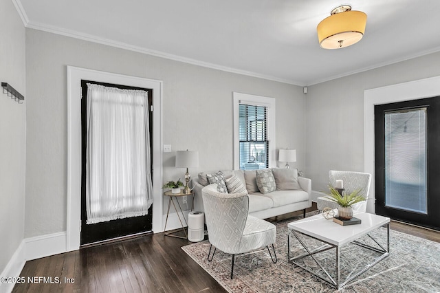 living room featuring dark hardwood / wood-style flooring and ornamental molding