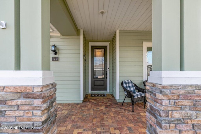 property entrance with a porch