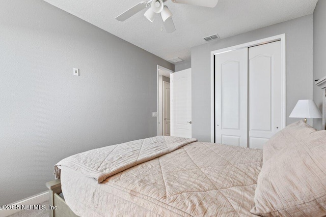 bedroom featuring a closet and ceiling fan