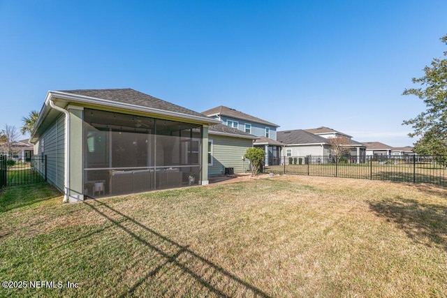 view of yard featuring a sunroom