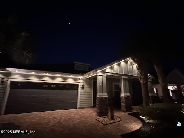 craftsman-style house featuring a garage