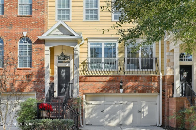 view of exterior entry with a garage