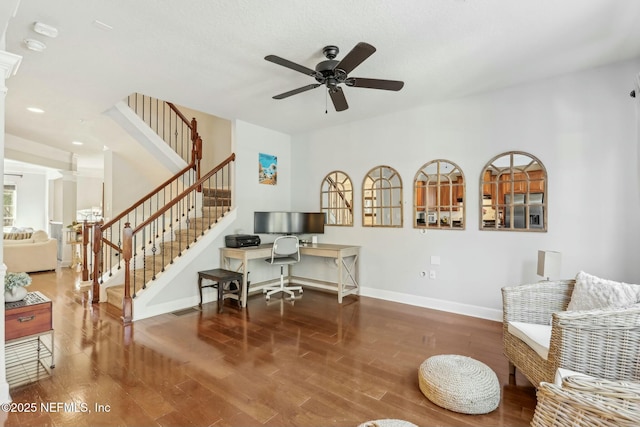 office area with ceiling fan and hardwood / wood-style floors