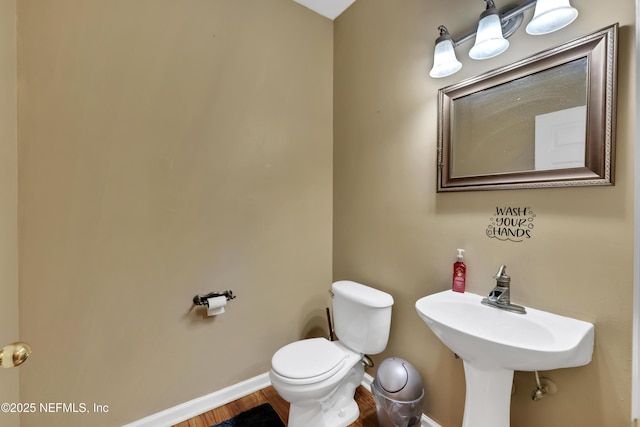 bathroom featuring toilet