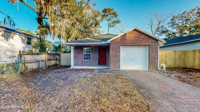 view of front of home with a garage