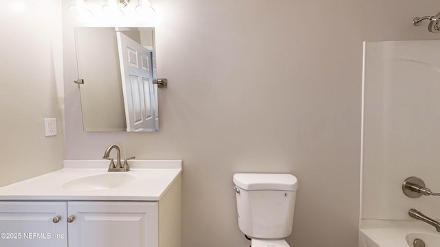 full bathroom with toilet, shower / bathing tub combination, and vanity