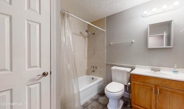 full bathroom with vanity, shower / bath combination with curtain, a textured ceiling, and toilet