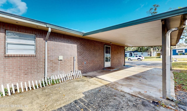 exterior space featuring a carport