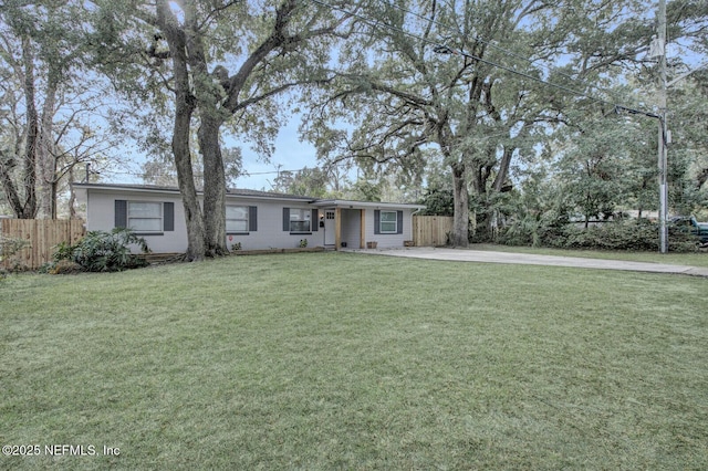 single story home with a front yard