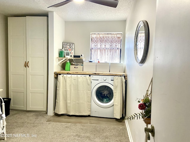 clothes washing area featuring light carpet, ceiling fan, a textured ceiling, and washer / dryer