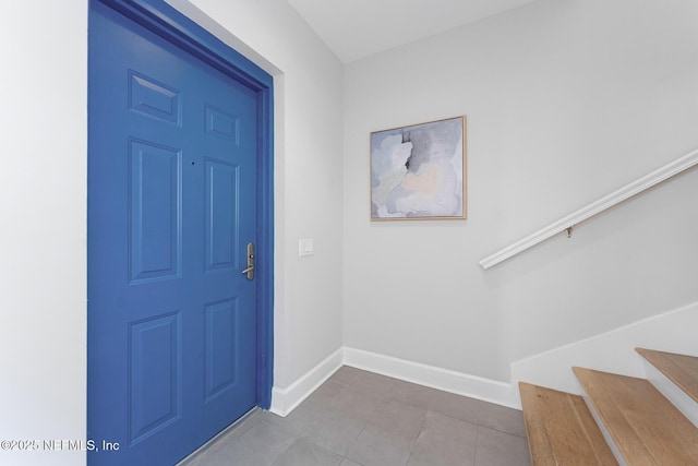 entrance foyer with tile patterned floors