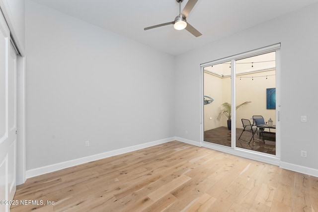 bedroom with hardwood / wood-style floors and ceiling fan