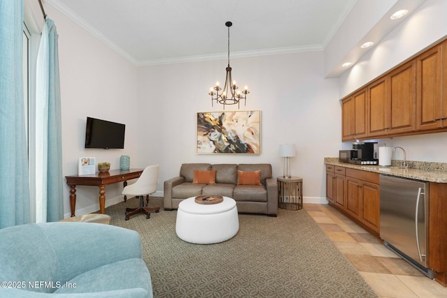 living room with a notable chandelier and ornamental molding