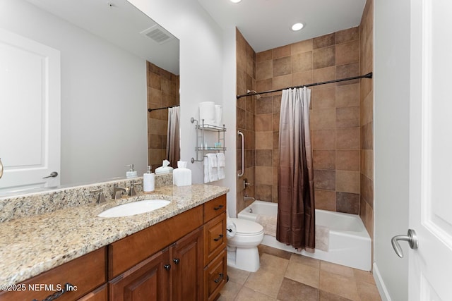 full bathroom with vanity, toilet, and shower / tub combo with curtain