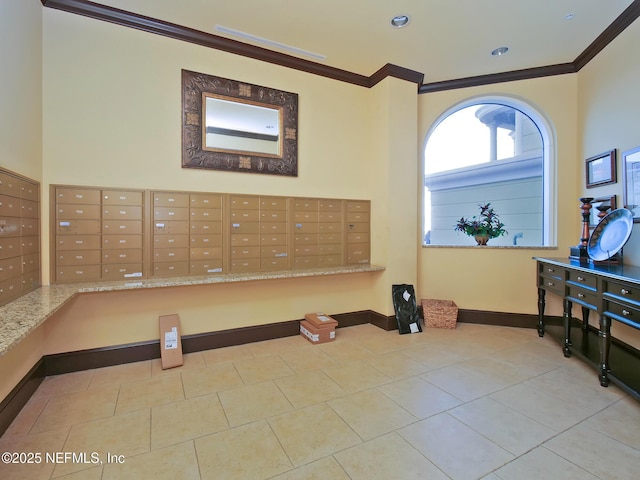 workout area featuring crown molding, mail boxes, and light tile patterned flooring