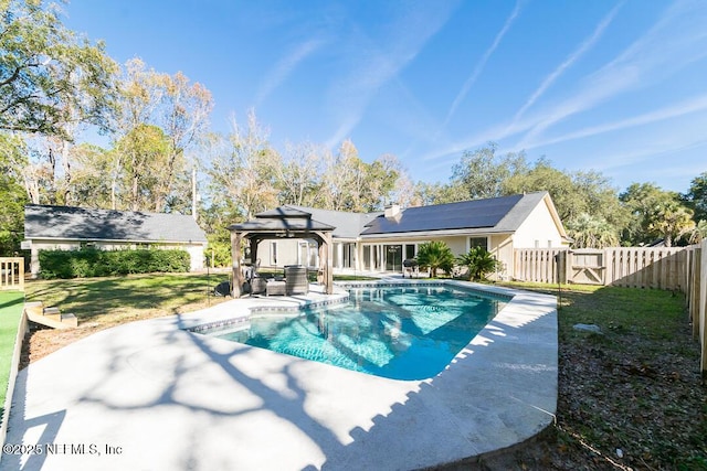 view of swimming pool featuring a gazebo, a patio area, and a lawn