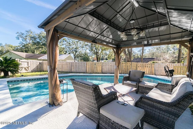 view of swimming pool with a gazebo