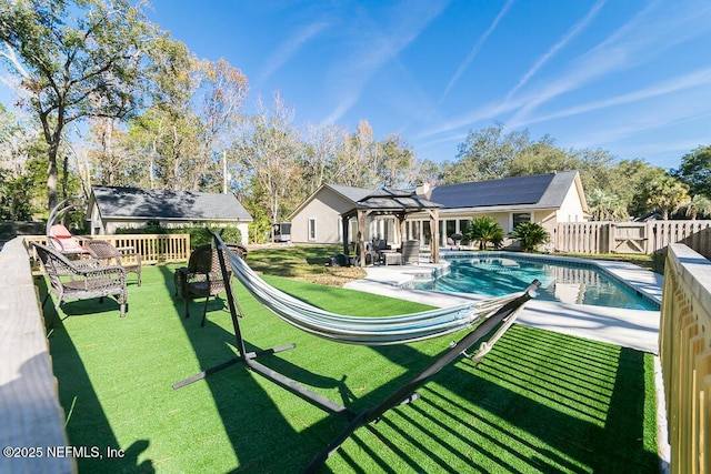 view of pool featuring a gazebo and a lawn