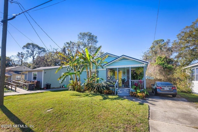 bungalow-style house with a front yard