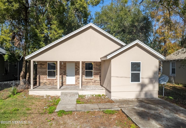 bungalow-style house featuring covered porch