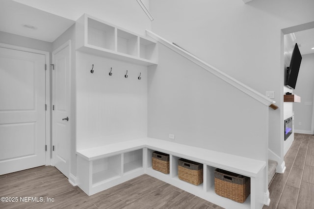 mudroom with hardwood / wood-style floors