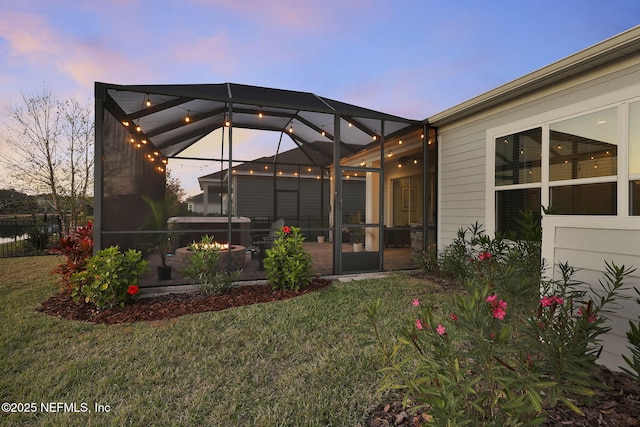 yard at dusk with glass enclosure