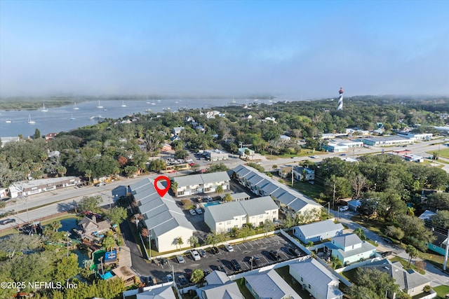 drone / aerial view with a water view