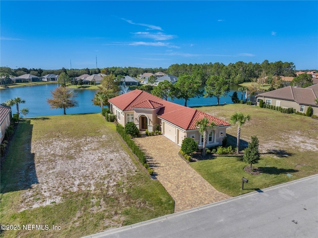 drone / aerial view featuring a water view