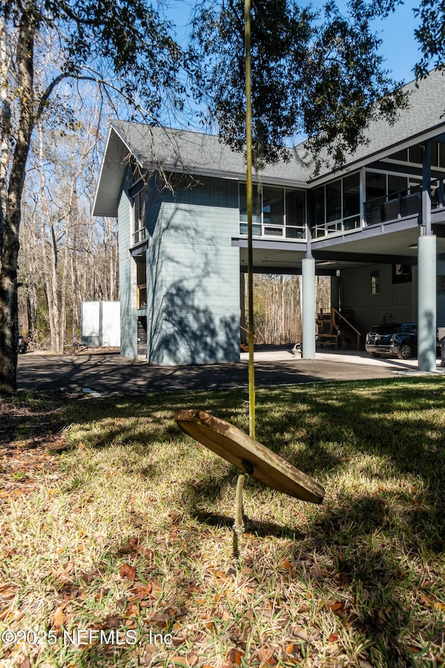 exterior space featuring a sunroom