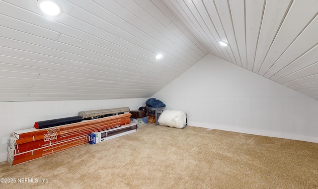 bonus room featuring lofted ceiling, wood ceiling, and carpet flooring