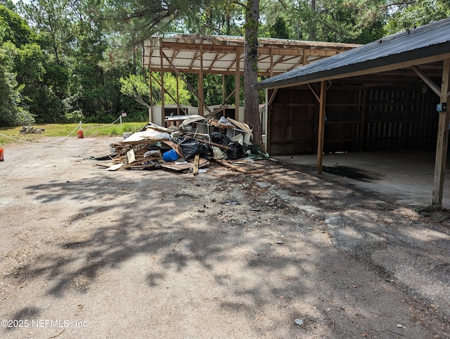 view of patio featuring an outdoor structure