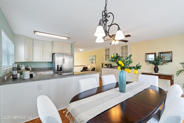 dining room featuring ceiling fan