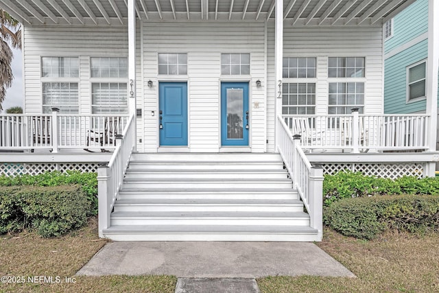 entrance to property with covered porch