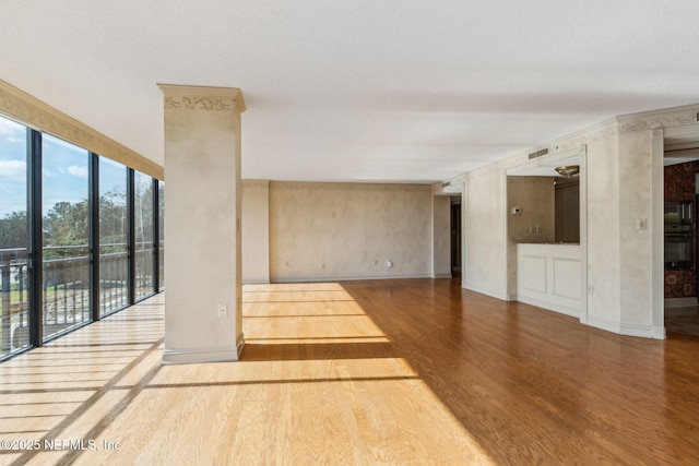 spare room featuring hardwood / wood-style flooring