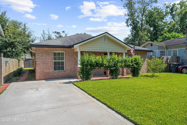 ranch-style home with a front yard