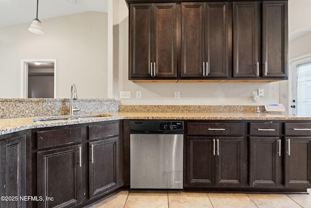 kitchen featuring dark brown cabinetry, vaulted ceiling, sink, decorative light fixtures, and dishwasher