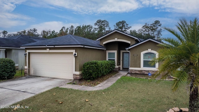 ranch-style home featuring a garage and a front lawn