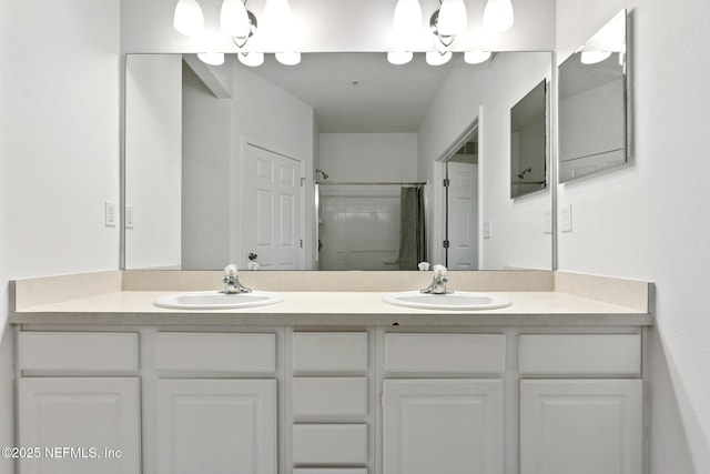 bathroom with a shower with curtain and vanity