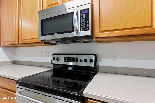 kitchen featuring appliances with stainless steel finishes