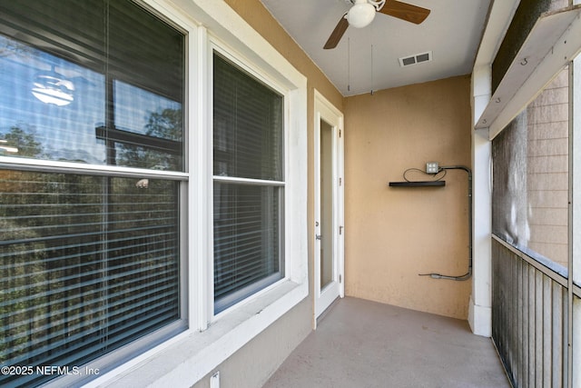 balcony featuring ceiling fan