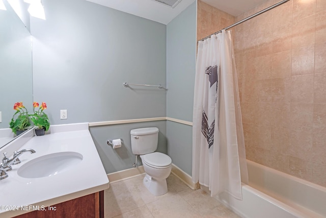 full bathroom featuring tile patterned flooring, vanity, shower / bath combination with curtain, and toilet