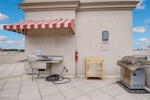 view of patio / terrace featuring a grill