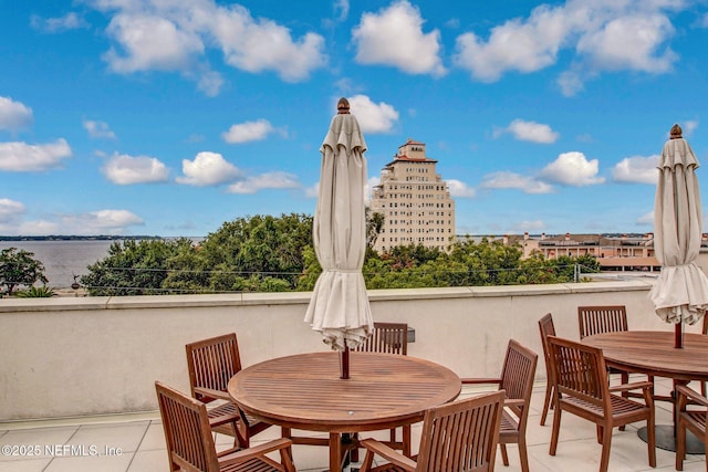 view of patio / terrace with a water view